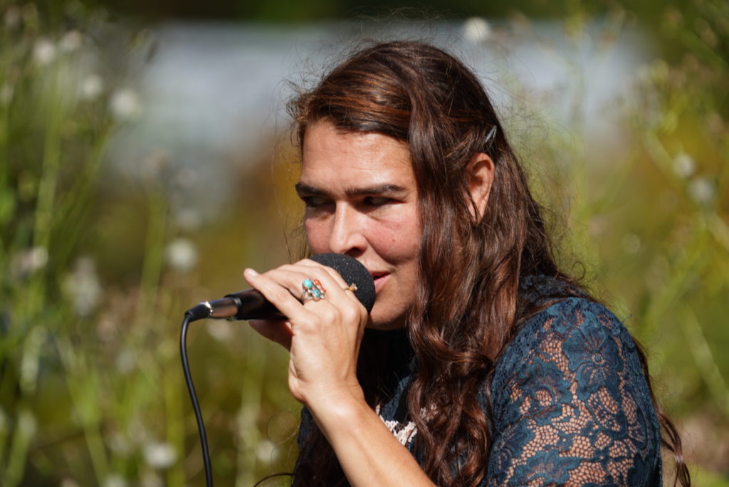 Anaelisa Jacobsen, founder of Manos Unidas, speaks at the Indigenous Peoples Day celebration in Great Barrington. Press photo courtesy of Alliance for a Viable Future
