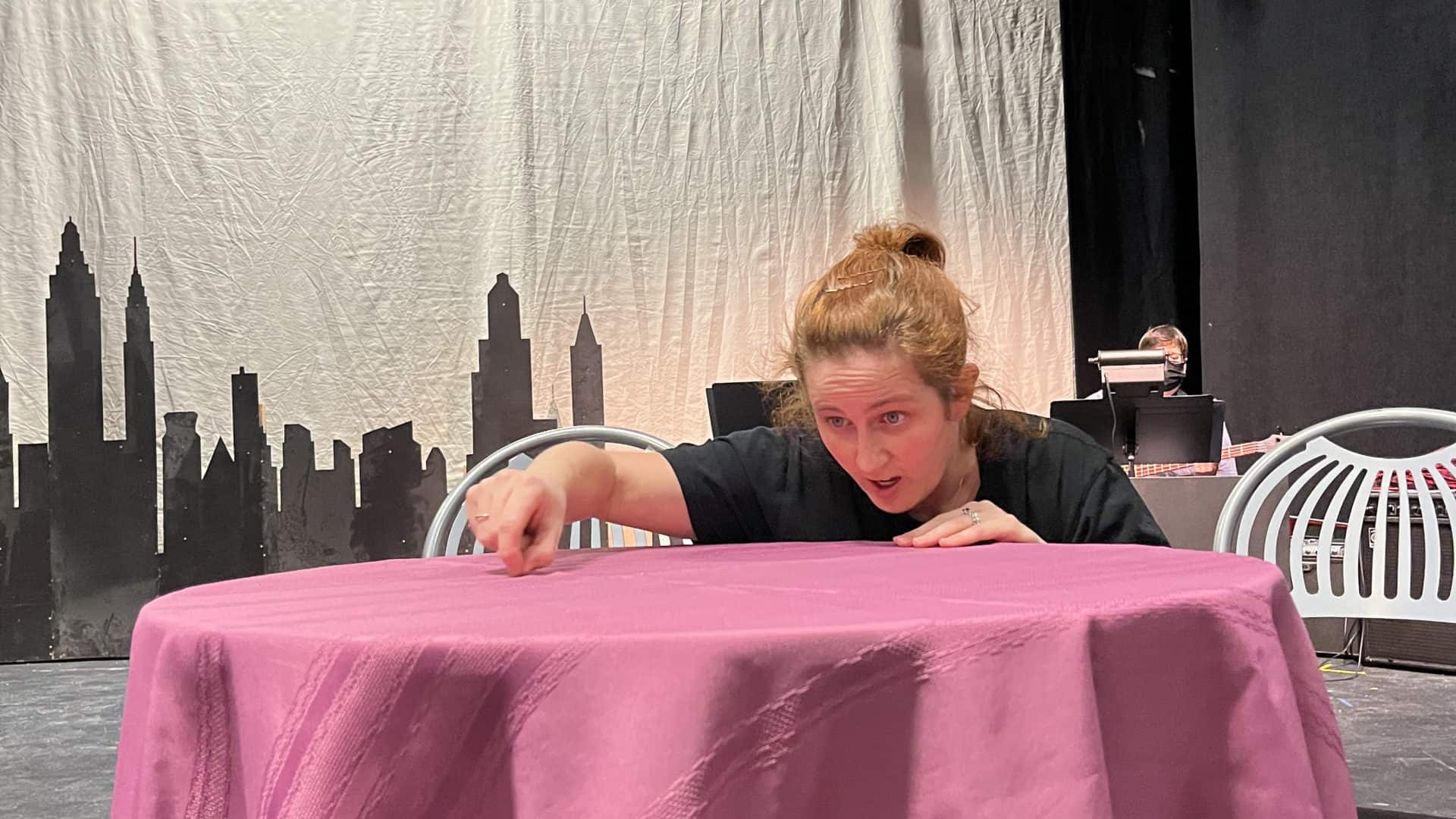 Caitlin Angell raps on a cafe table in Slideshow, an evening of short plays at the Bennington Performing Arts Center. Press photos courtesy of the Bennington Community Theater