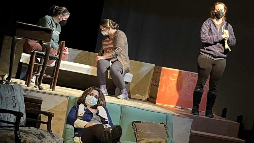 Caitlin Angell, Debbie Warnock and fellow cast members gather in Slideshow, an evening of short plays at the Bennington Performing Arts Center. Press photos courtesy of the Bennington Community Theater