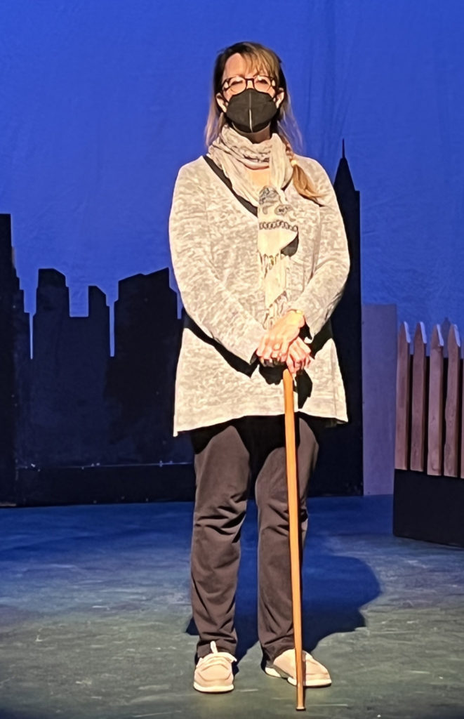 Ingrid Madelayne stands on stage in an imagined city backyard in Slideshow, an evening of short plays at the Bennington Performing Arts Center. Press photos courtesy of the Bennington Community Theater