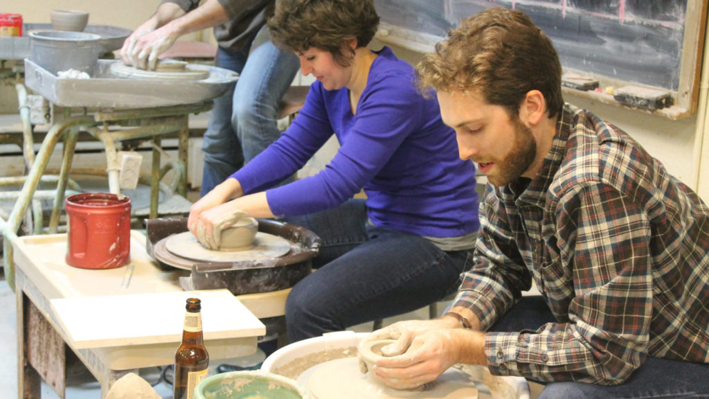 A workshop throws clay on pottery wheels at Berkshire Arts Center. Press image courtesy of the BAC