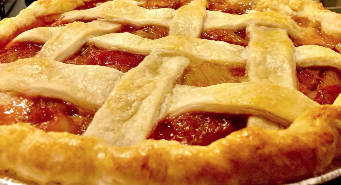 Latticed pie crust shows glimpses of the fruit within from Bohemian Nouveaux bakery.