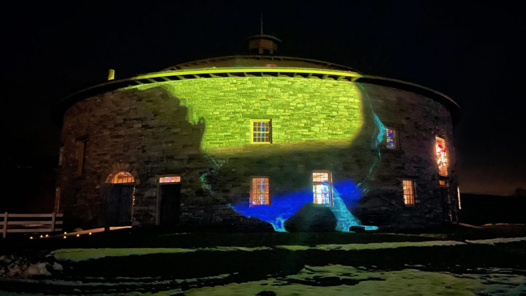 Joe Wheaton's light projections illuminate the Round Stone Barn.