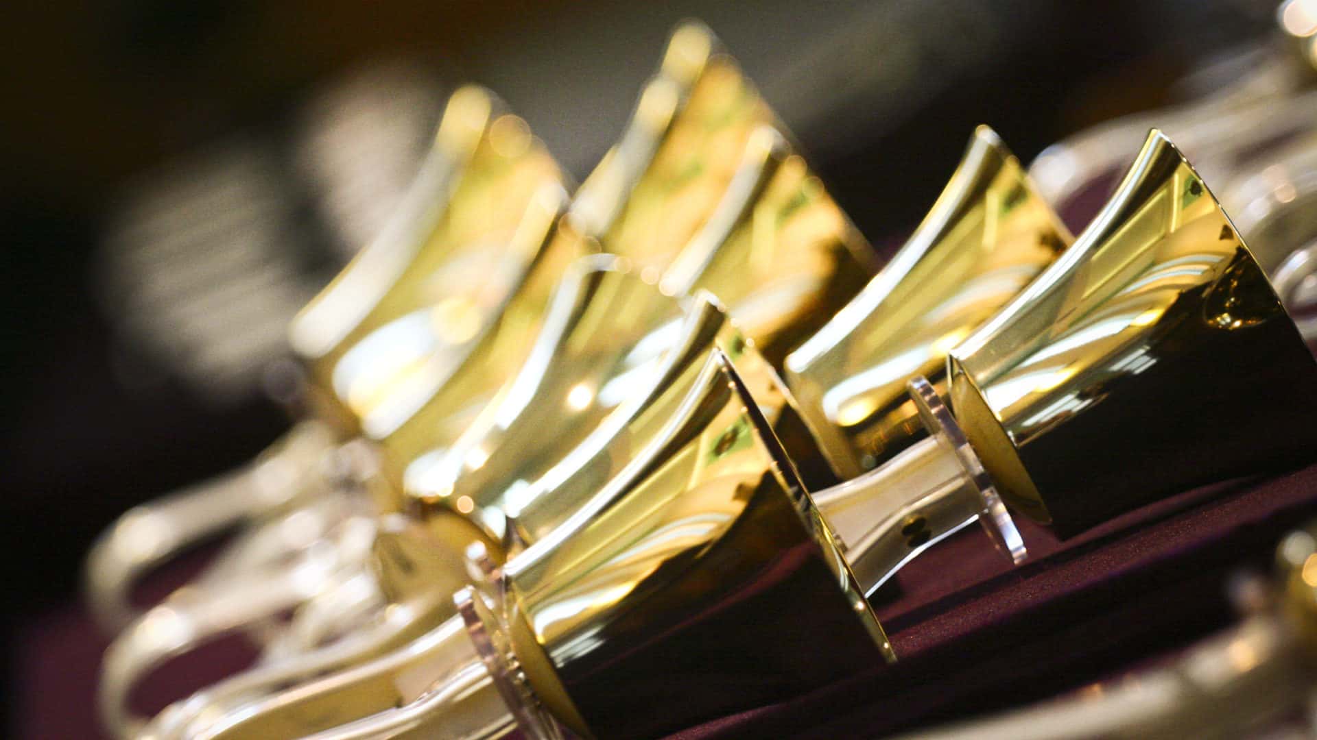 Handbells gleam golden in the dark. Creative Commons courtesy photo