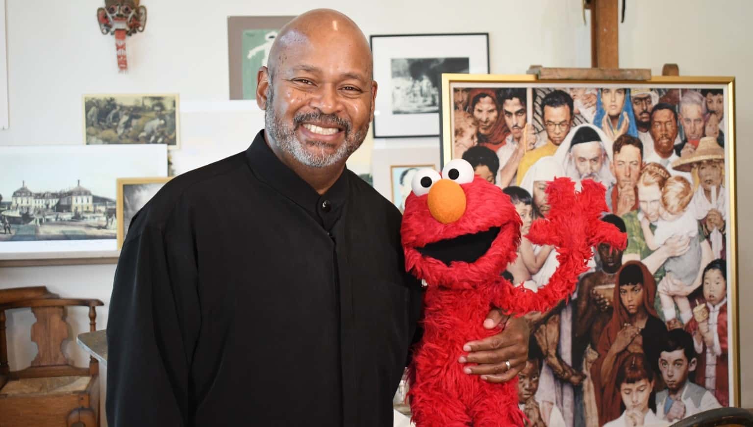Louis Henry Mitchell, Creative Director of Character Design for Sesame Workshop, will talk creative expression, waves wiith Elmo. Press image courtesy of the Norman Rockwell Museum