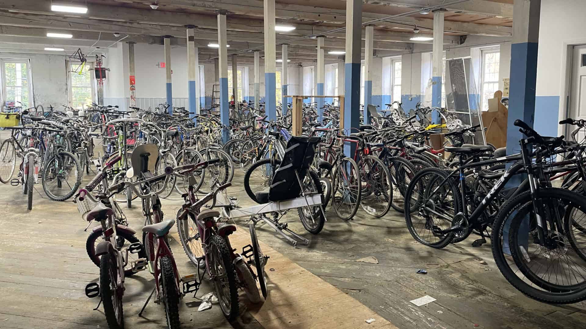 A fleet of repurposed bikes fills an upper floor at the Old Stone Mill in Adams.