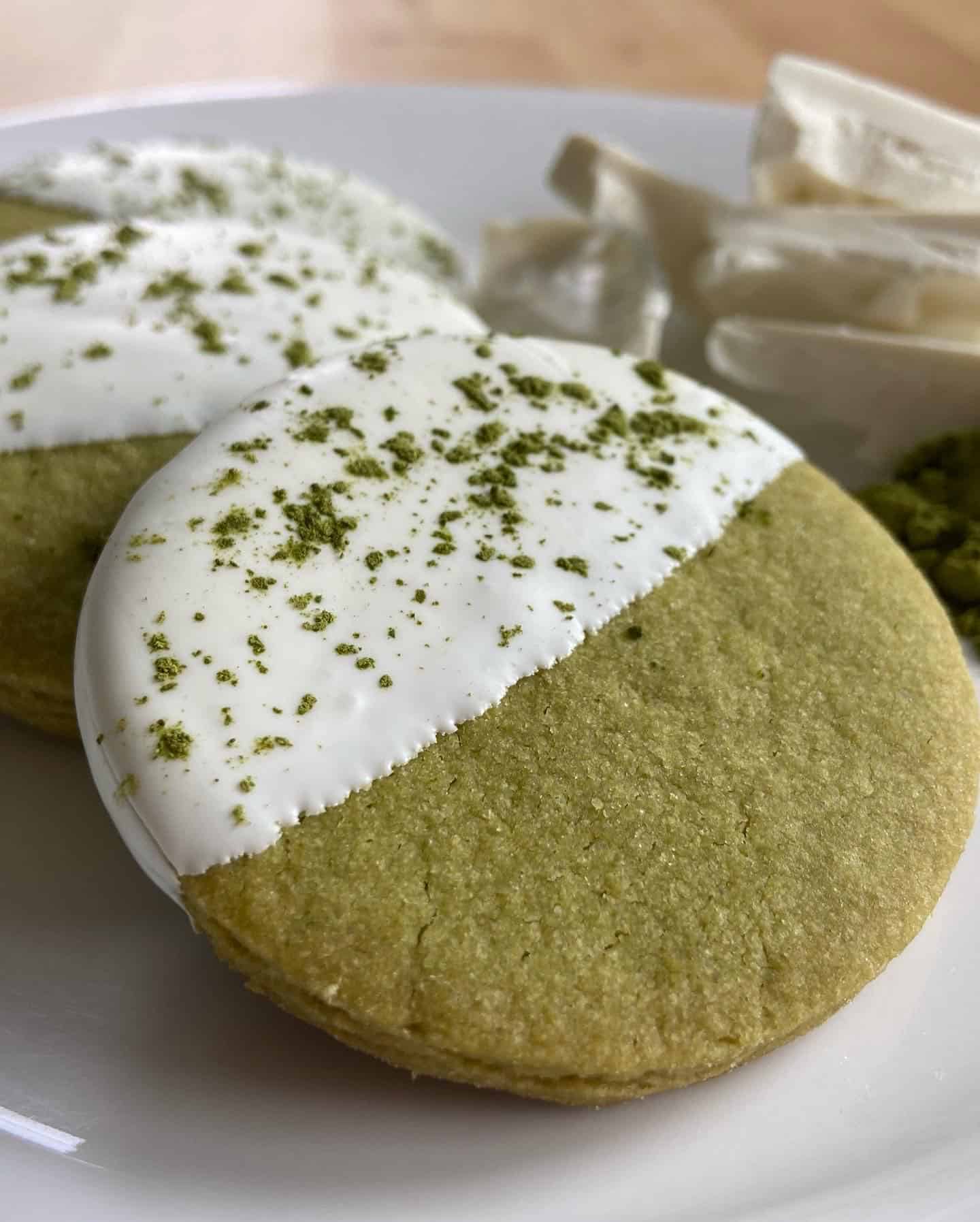 Macha shortbread cookies from Sweet Sam Bakes are dipped in white chocolate. Press photo courtesy of the artist