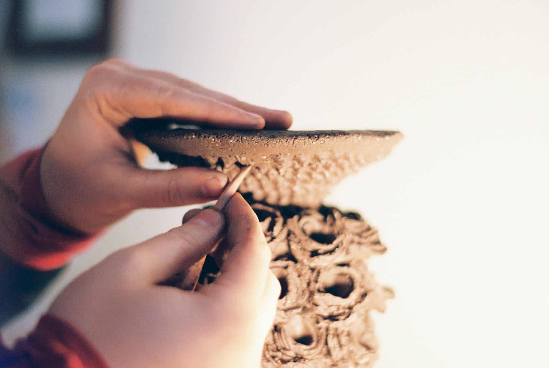 Ceramics artist Karlene Jean Kantner shapes earthenware vessels by hand. Press photo courtesy of the artist