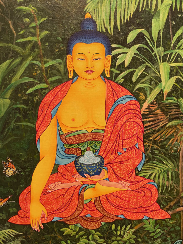 Tibetan artist Karma Phuntsok's Natural Buddha with Wildlife sits touching the earth in the Australian woodlands of his home.
