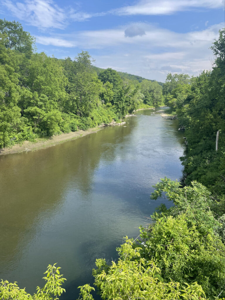 The Hoosic River flows from the south and east toward Williamstown and on into Vermont, with mountains in the distance.