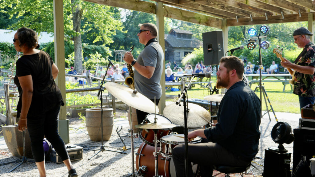 Musicians perform outdoors on a sunny day at Berkshire Botanical Garden. Photo courtesy of BBG