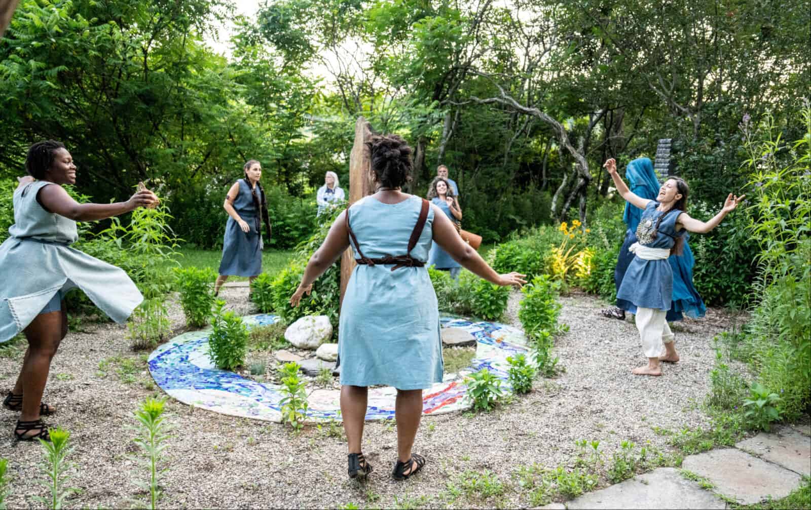The Bacchae sing and perform in the garden of Semele at Double Edge Theatre. Press photo courtesy of the theatre