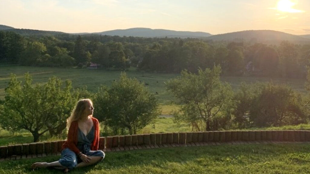 A visitor meditates on the lawn in the gardens at Naumkeag. Press photo courtesy of the Trustees of Reservations.