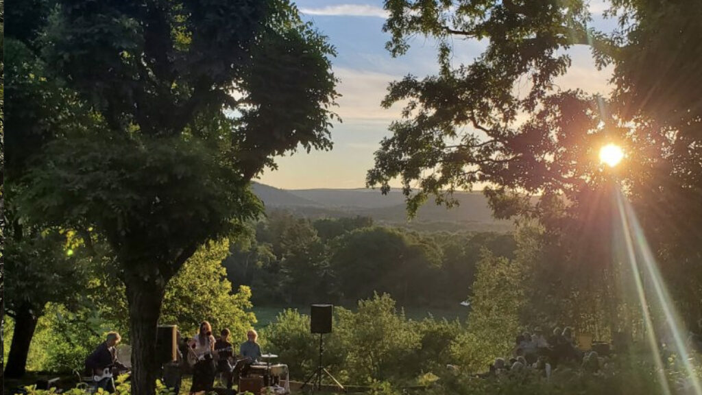 The gardens at Naumkeag shine golden in a summer sunset. Press photo courtesy of Trustees of Reservations
