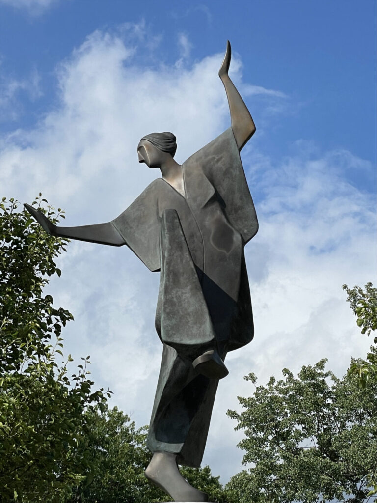 Carol Gold's bronze form of a dancing woman graces the common in Pittsfield.