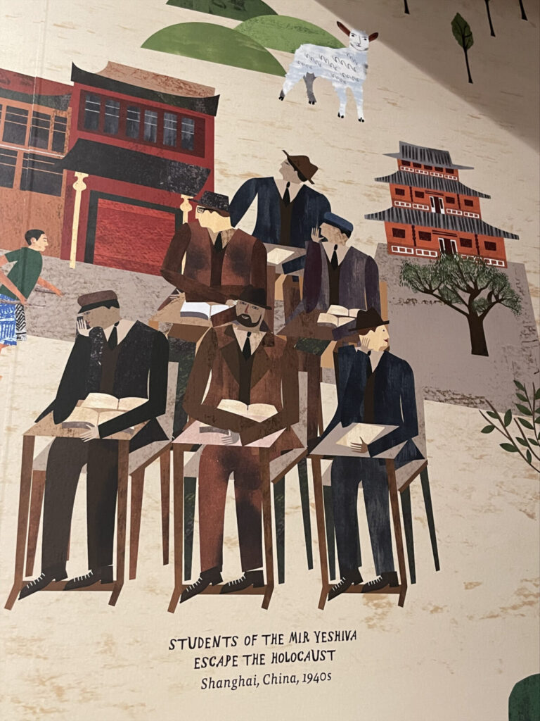 In a mural showing the global reach of Yiddish, students at the Mir yeshiva in China survive the Holocaust. Press photo courtesy of the Yiddish Book Center in Amherst.