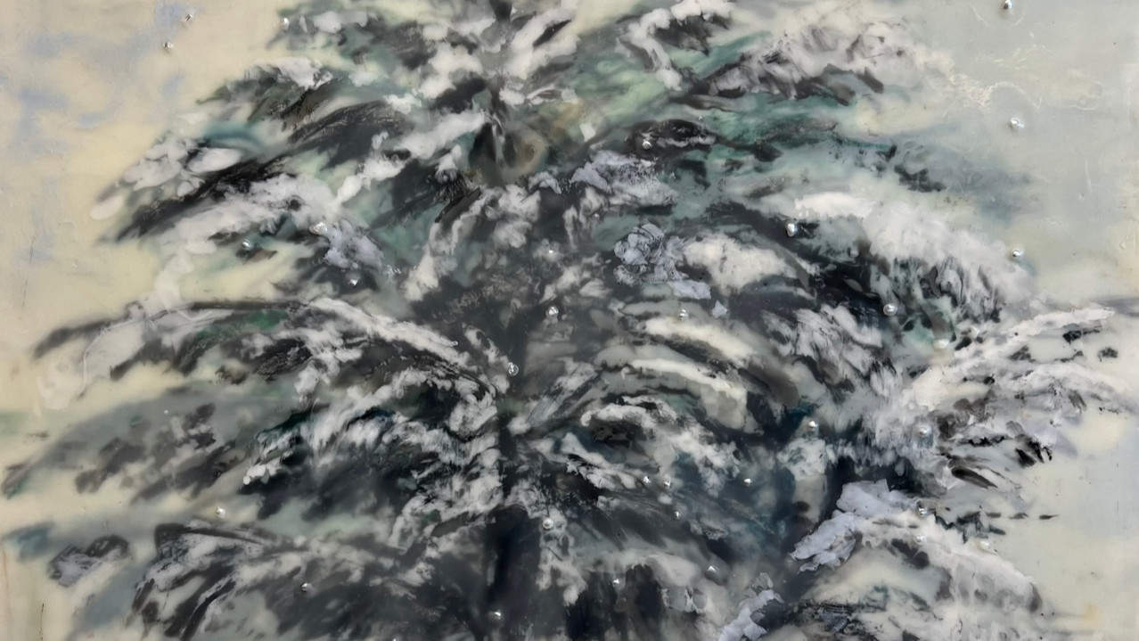 Snow coats the branches of an evergreen in a painting by Linda Petrocine. Press image courtesy of First Fridays Artswalk