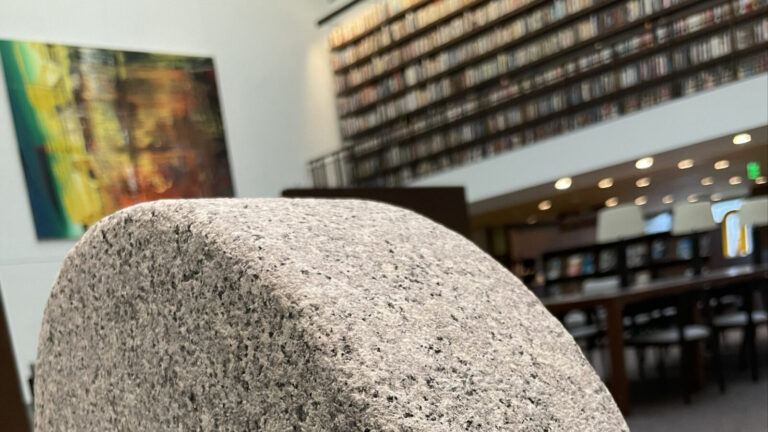 Artist Elizabeth Atterbury's stone sculpture in the form of a chop, a personal seal, stands in the reading room in the Manton Center at the Clark Art Institute.