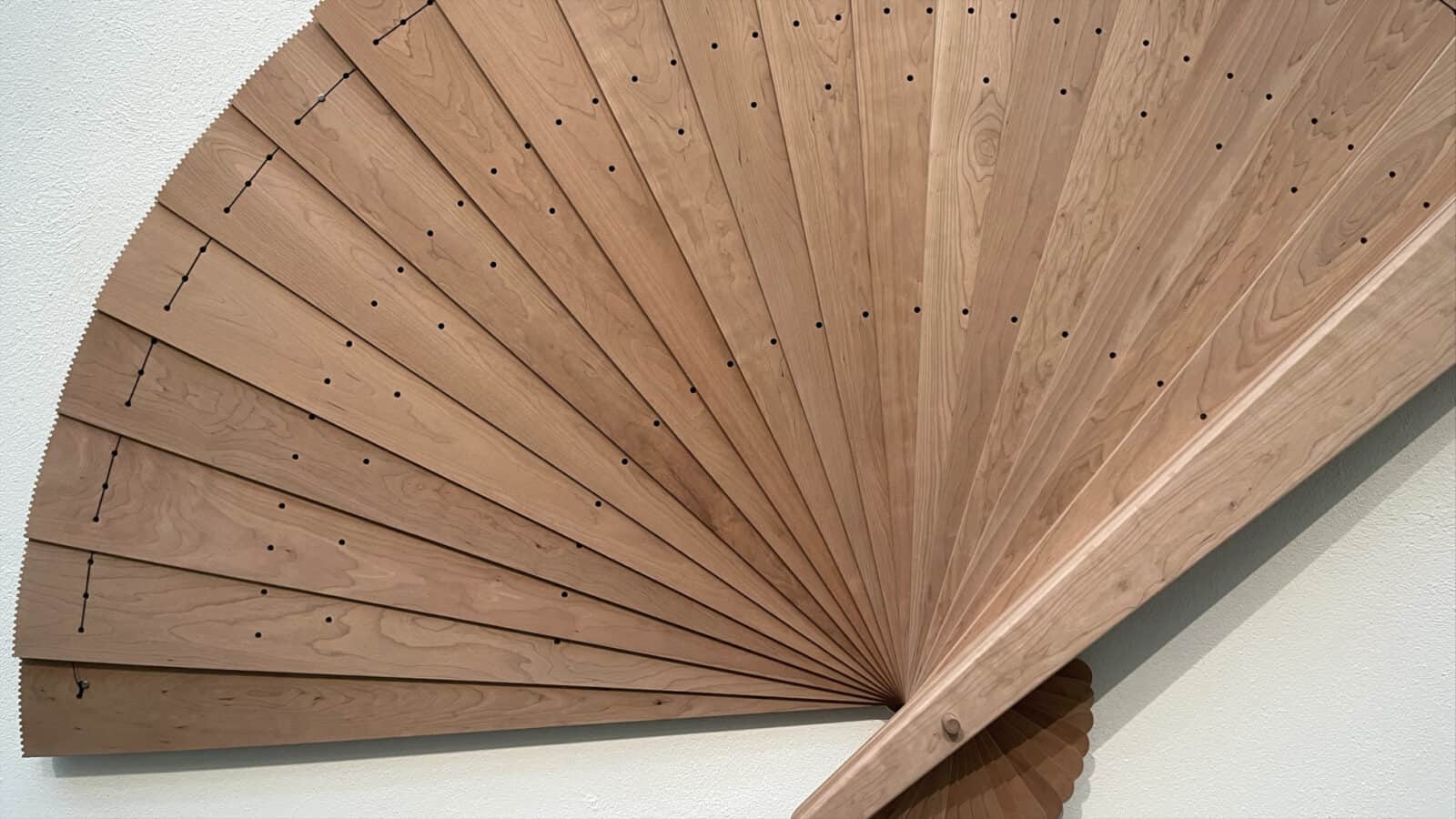Elizabeth Atterbury recalls her grandmother's fan in an arc of cherry wood as tall a woman, at the Clark Art Institute.
