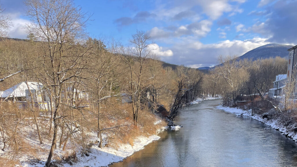 The Hoosic River reflects the sky on a snowy early winter day, looking south from the Bridge on Cole Ave. in Williamstown.