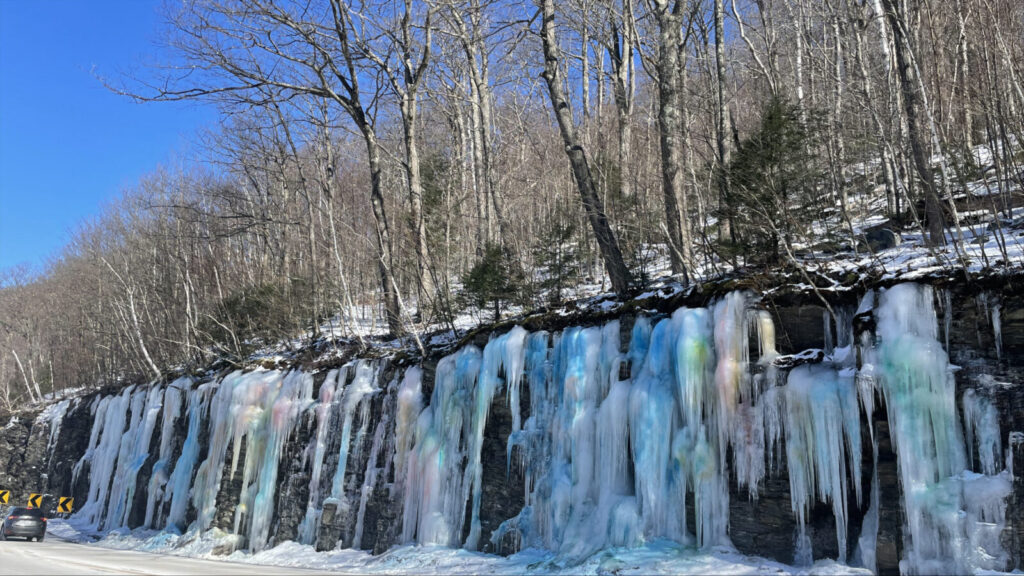 Ice gleams in rainbow colors near the hairpin bend in North Adams.