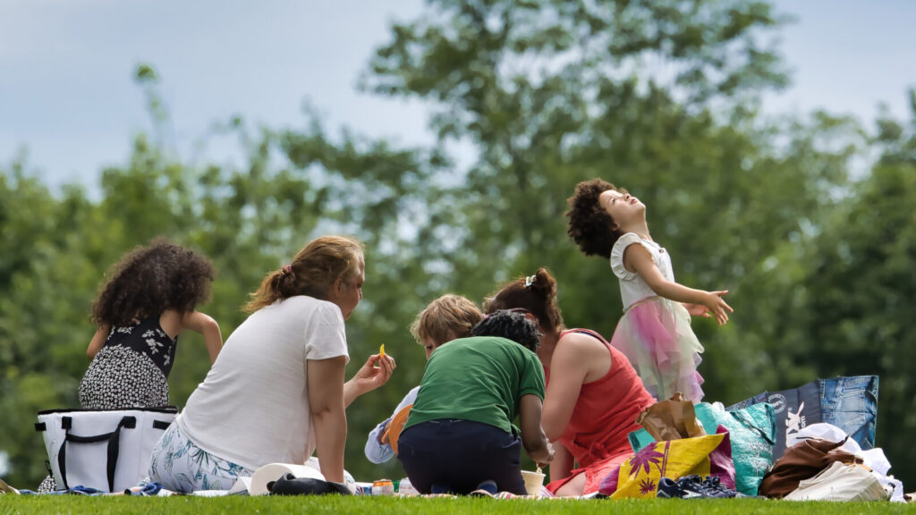 A family picnics on the lawn at Tanglewood. Photo courtesy of the Boston Symphony Orchestra