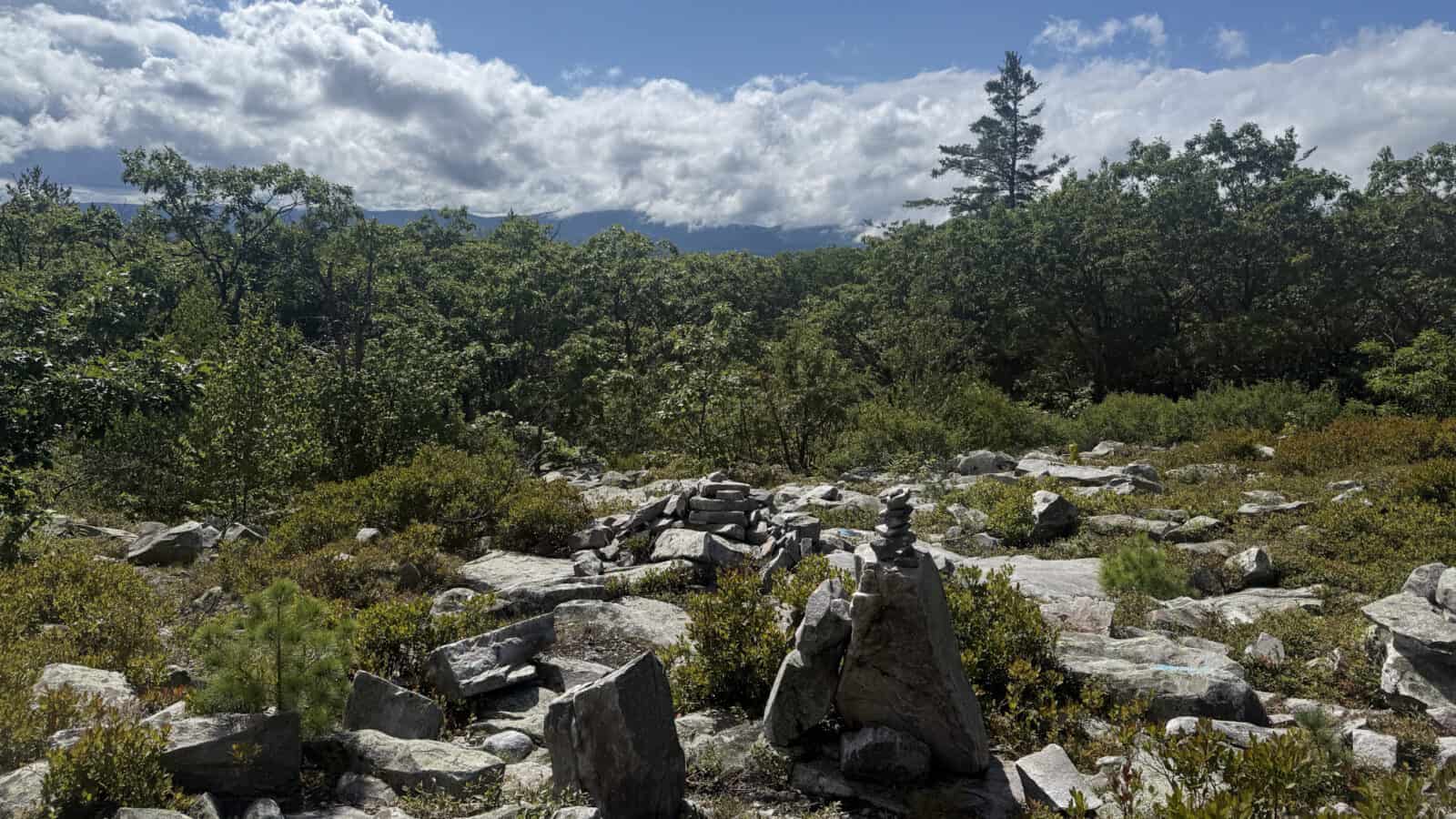 Cairns of stones mark the summit along the Appalachian and '98 trails near Pine Cobble.